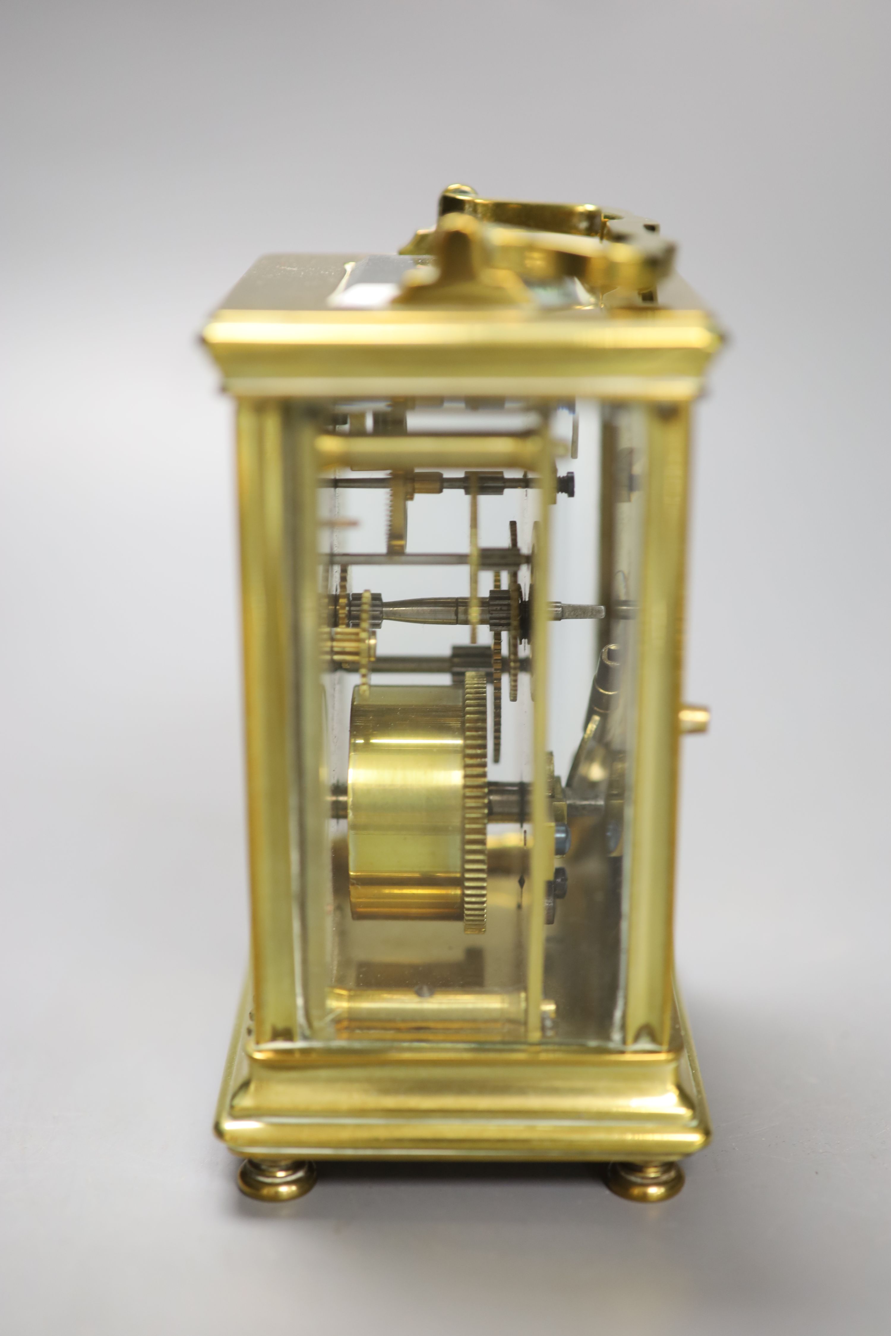 A French brass-cased carriage timepiece, height 10.5cm with handle down